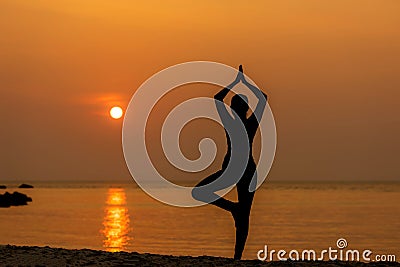 Silhouette lifestyle woman yoga exercise for healthy life. Stock Photo
